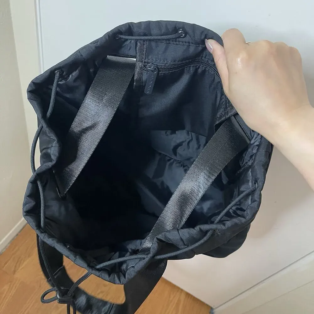 Beyond Yoga convertible gym bag black backpack with drawstring closure